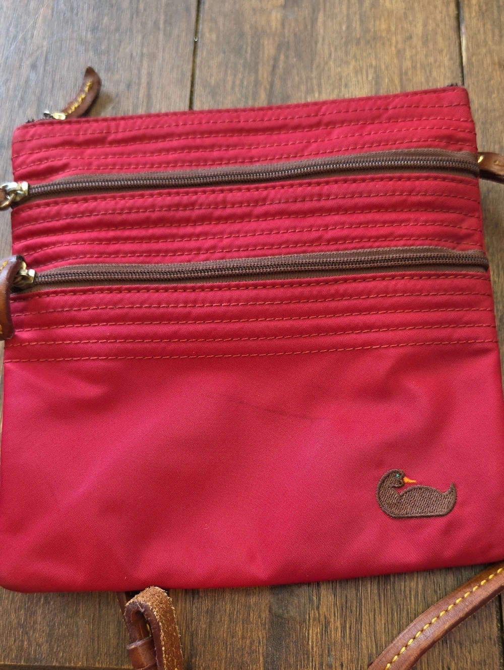 Dooney & Bourke Nylon North South Triple Zip Pink Crossbody Bag